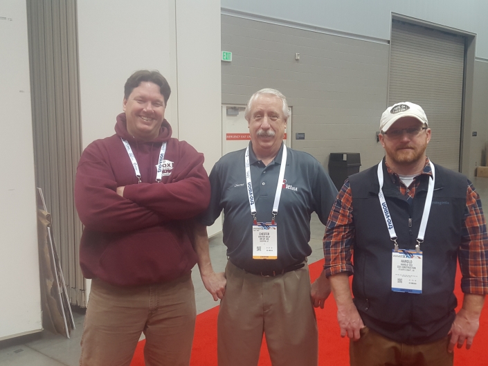 Harold & Greg from Cox Construction stop by the HotJet USA Booth (posing with Chester - center - from HotJet USA).